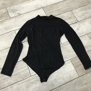 Black long sleeve body suit
